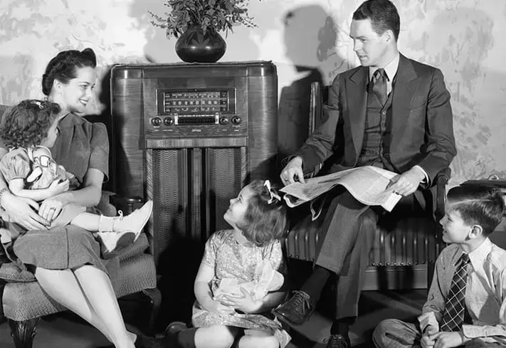 family listening to radio